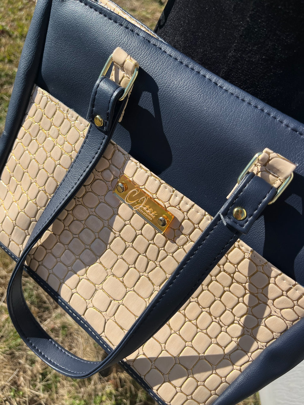 The Becca Handbag in Cream/Navy Blue