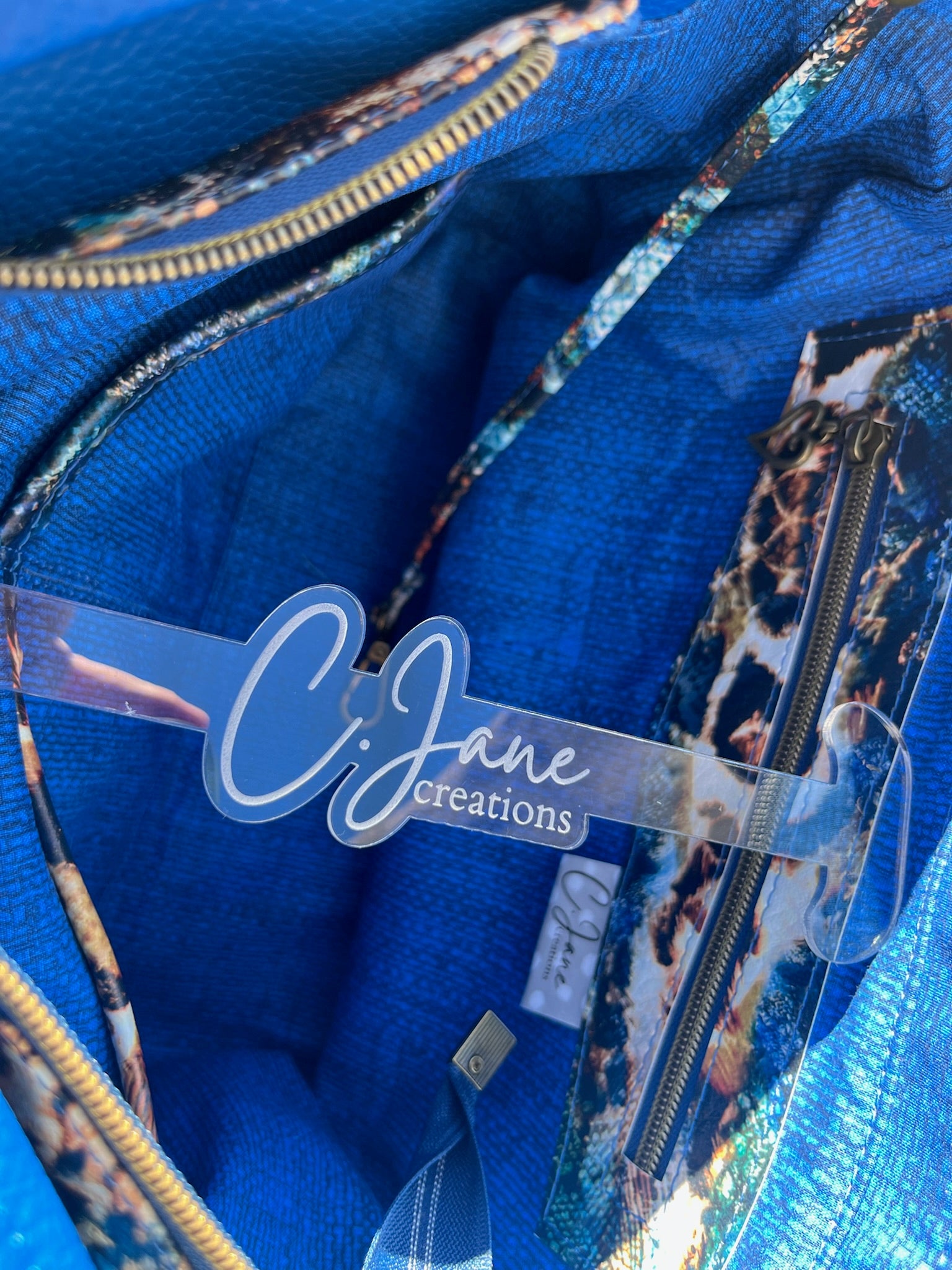 Leilani Handbag in Blue/Animal