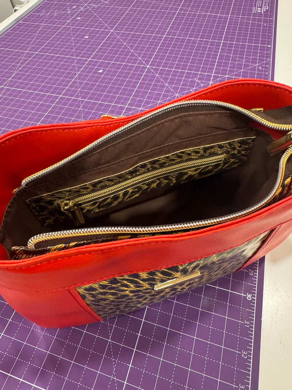 The Eva Crossbody in Red/Animal print